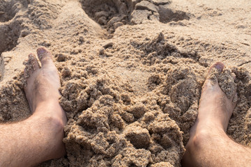 feet in the sand