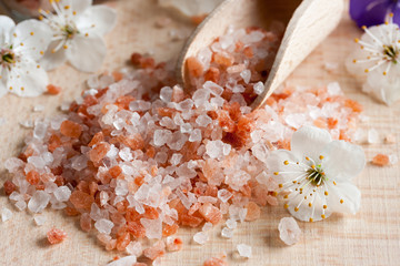 Pink Himalayan sea salt on a wooden table
