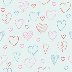Seamless pattern with hand drawn hearts - concept of a wrapping paper. Vector.