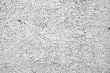 Wall fragment with scratches and cracks