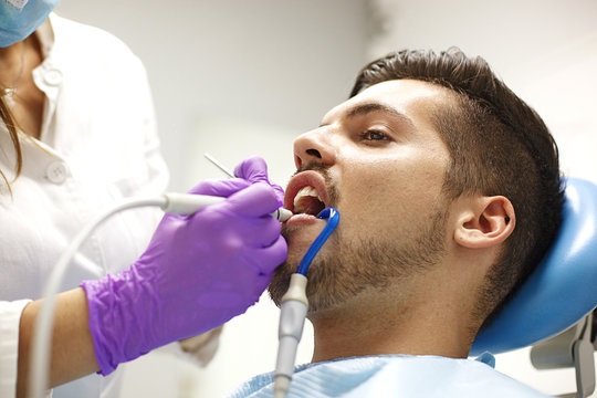 Young Man At The Dentist