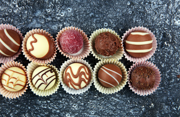 a lot of variety chocolate pralines, belgian confectionery gourmet chocolate.