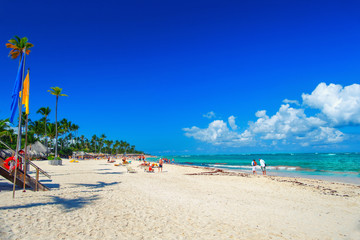 Fototapeta na wymiar Sunny beach, white sand. Dominican Republic, Bavaro coast beach