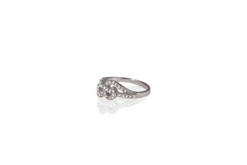 Silver precious treble clef ring female with diamonds on white background. Good material for design jewelery.