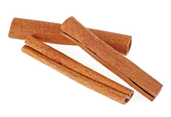 Cinnamon sticks on white background