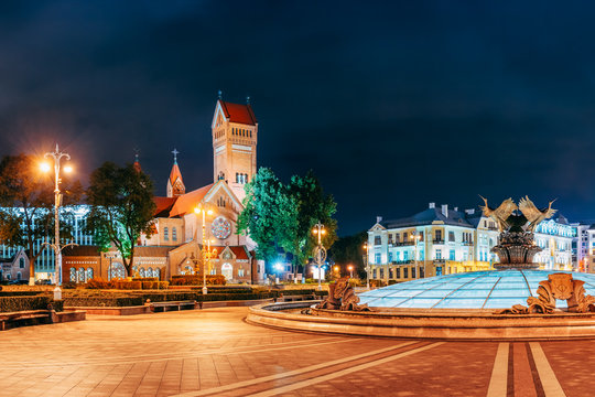 Minsk, Belarus. Night View Church Of Saints Simon And Helen Or Red Church