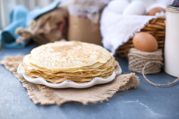 Thin sweet pancakes. traditional Russian food in the spring. Festive treat. Homemade breakfast. Free space for text or a postcard.