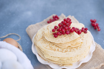 Thin sweet pancakes. traditional Russian food in the spring. Festive treat. Homemade breakfast. Free space for text or a postcard.