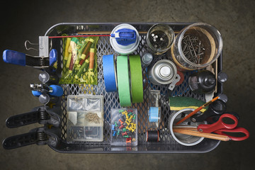 a rolling cart with school and office supplies