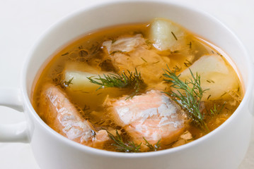 Salmon soup in a saucepan.