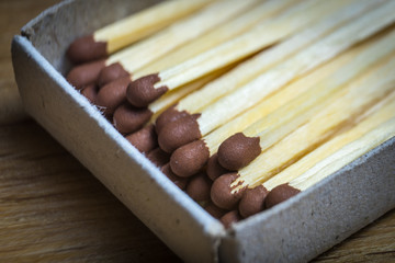 The open boxes of matches are photographed close-up.