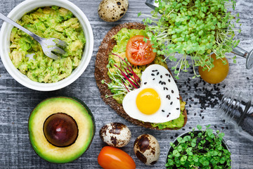 bruschetta with avocado microgrin, quail eggs and Adyghe cheese and mozzarella