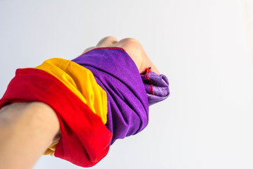Spanish republic flag in a man hand with white background, spain republic