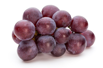 Ripe red grape isolated on white.
