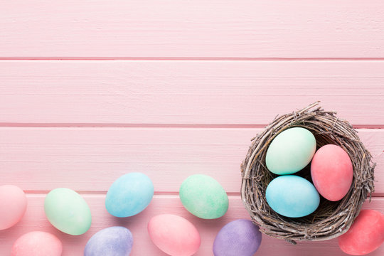 Pastel Easter eggs background. Spring greating card.