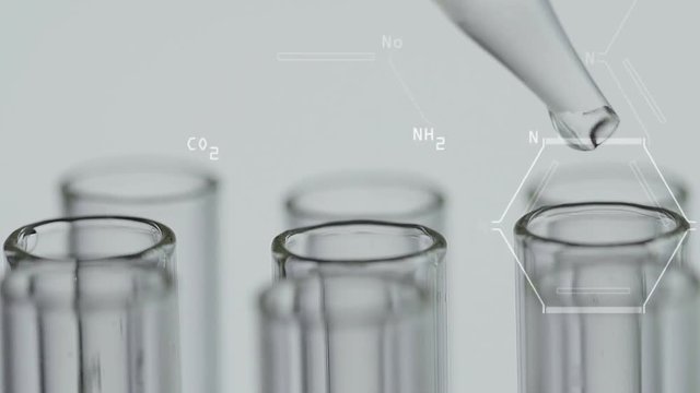 Close up of laboratory scientist working with a pipette analyzes and extract the DNA or molecules in the test tubes.on green background with graphic interface
