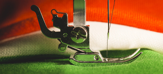 Detail of the leg of a sewing machine, with tricolor cloth of the Italian flag