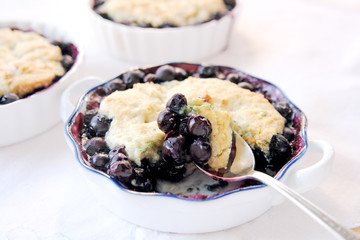 Individual servings of fresh blueberry cobbler