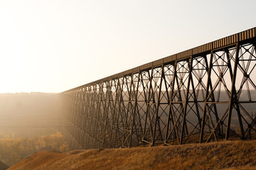 Giant steel train bridge in fog