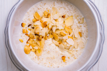 Oatmeal porridge with banana and almonds