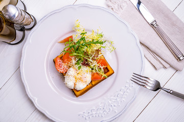 Waffle with poached egg