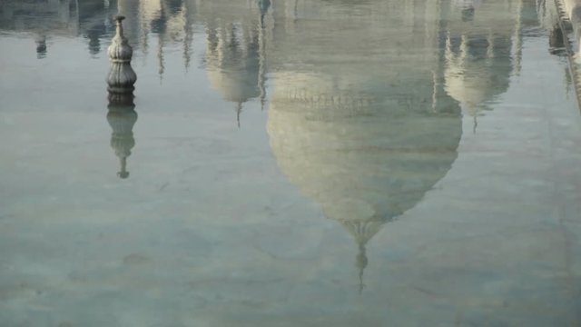 Close up, reflection of Taj Mahal in pool