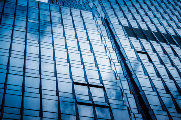 Clouds Reflected in Windows of Modern Office Building.