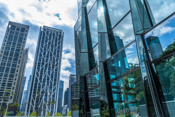 Fototapeta premium Modern office building against blue sky.