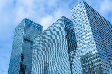 Fototapeta premium Modern office building on a clear sky background.