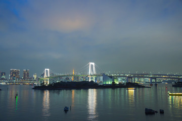 Fototapeta na wymiar Rainbow bridge in twilight at odaiba Japan