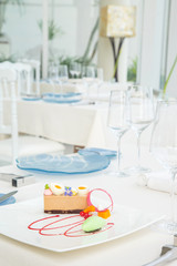 Elegant dessert served on restaurant table - molecular gastronomy, haute couture dessert