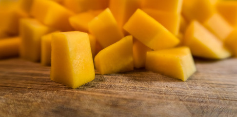 Butternut squash or mango chopped on wooden table - 192253912