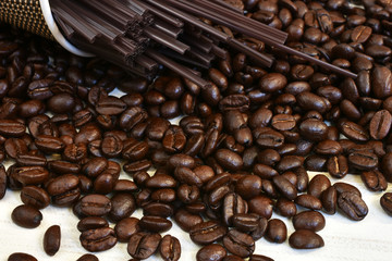Roasted Coffee Beans and Stir Stick Background