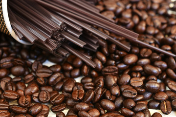 Roasted Coffee Beans and Stir Stick Background