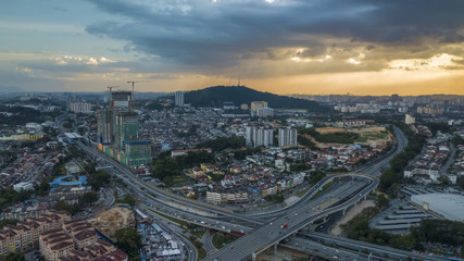 Aerial view of KL City suburb showing road and rail interchange
