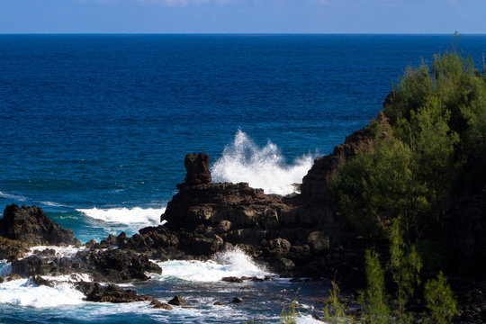 Volcanic rock and Pacific surf on the coast of Maui, Hawaii