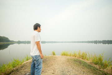 man at the blue lake