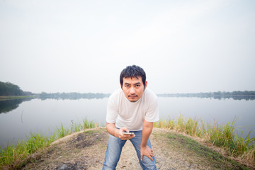 man at the blue lake