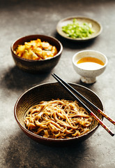 Freshly cooked noodles in a bowl. Asian cuisine meal.