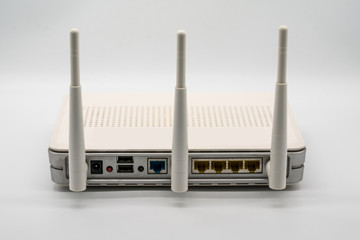 Wi-Fi wireless router with three antenna isolated on white