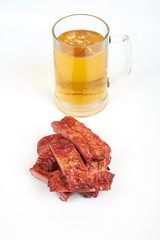 Grilled pork ribs and beer isolated on white background