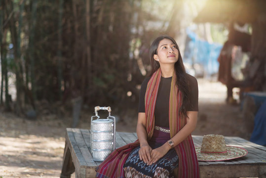 Local asia thai woman sitting and relaxing at  the local house