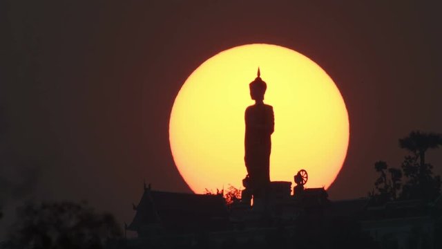 Sunset at Wat Phra That Doi Kham in Chiang Mai, Thailand.