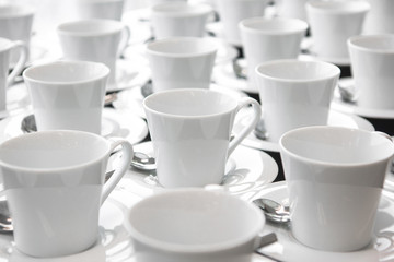 Obraz na płótnie Canvas Group of ceramic white cup serving tea or coffee.