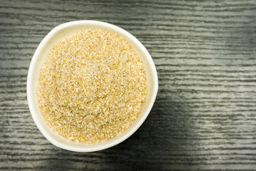 Bowl with spelled bran. View from above.