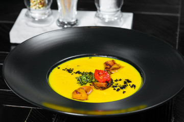 Soup. Chef's specialty presented in restaurant on served table. Clouse up.
