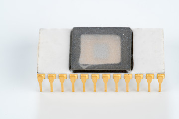Electronic chip isolated on dark blue