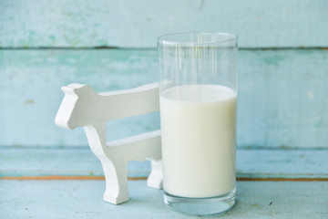a glass of cow's milk and cow, the concept of gluten and village products