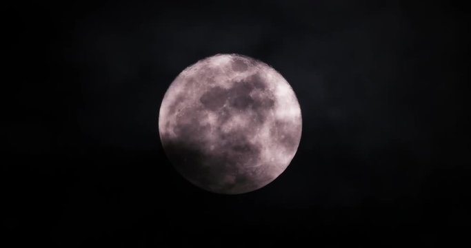 Large Full Moon Glowing Through Passing Clouds, 4K