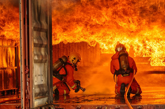 Firefighters fighting a fire,Firefighter training with gas and flame